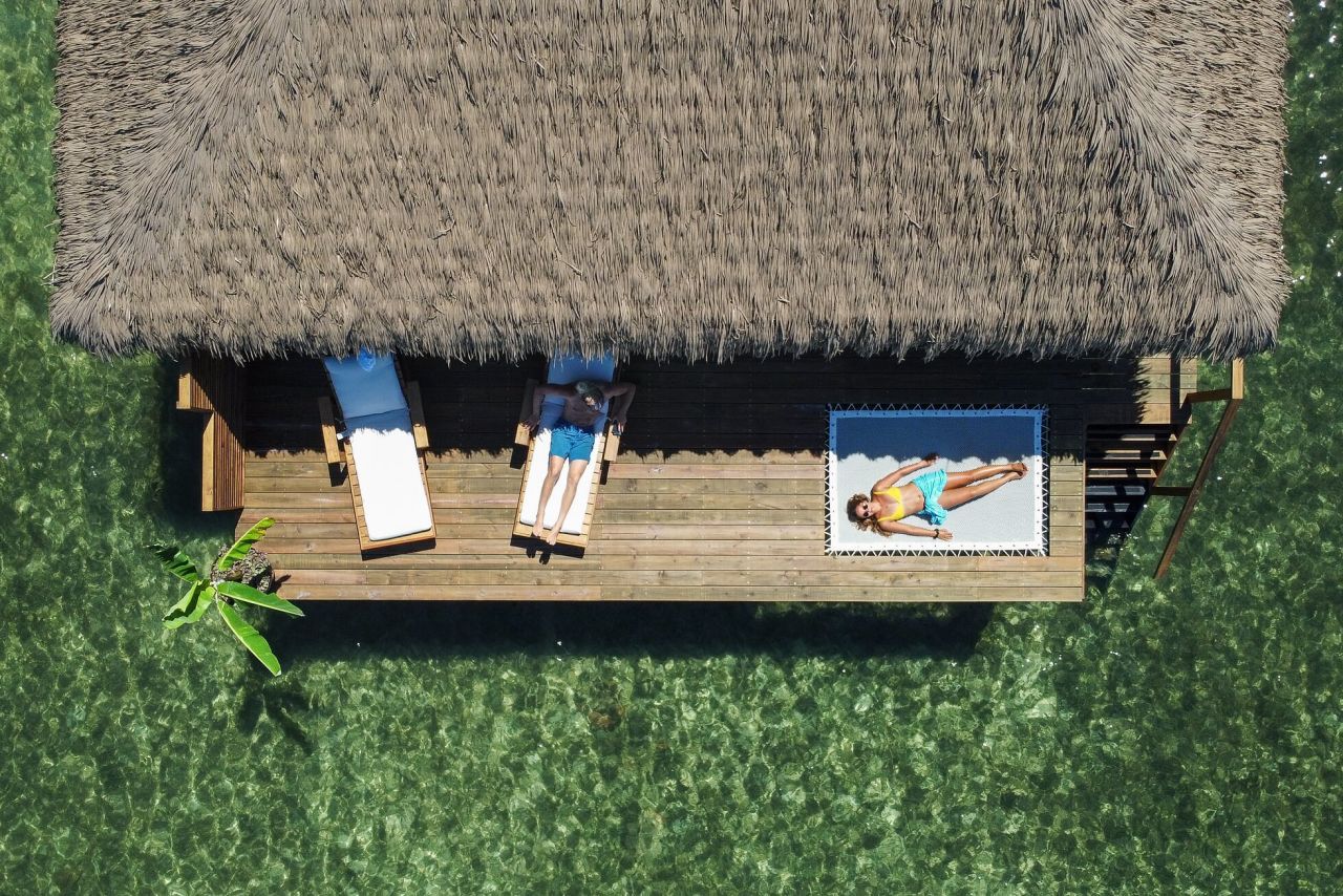 Couple in Overwater Bungalow in Bocas del Toro, Panama